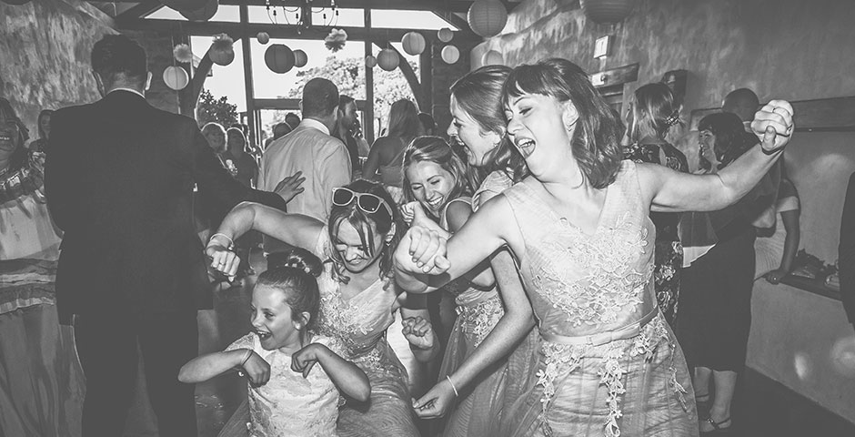 Bridesmaid getting their groove on the dancefloor