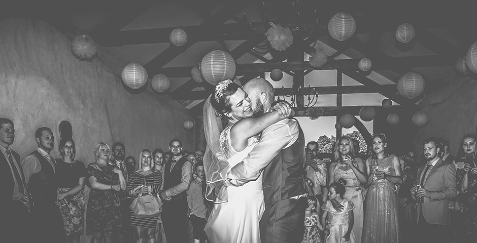 Couple laughing while enjoying their first dance
