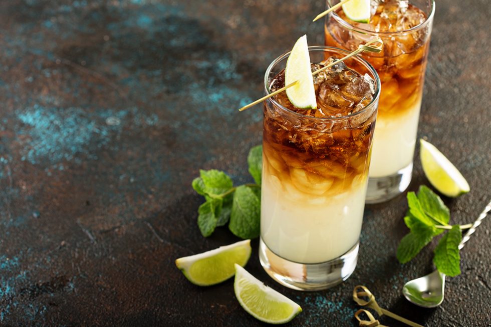 Dark and stormy cocktail with ginger ale and rum