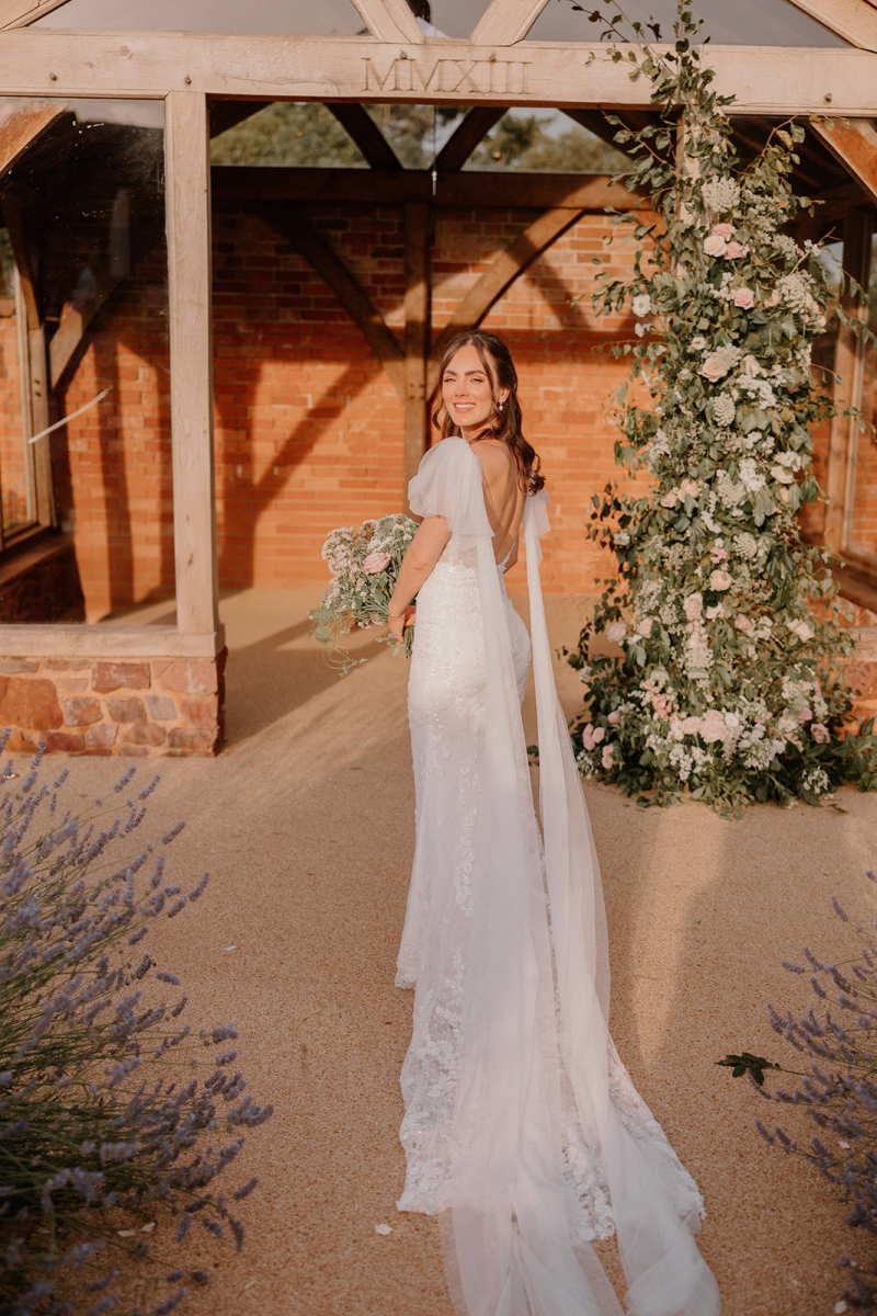 The Bride in Walled Garden by Sophie Mort Photography